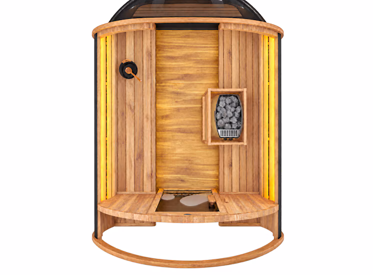Top-down view of a small wooden sauna with curved benches, a heater with stones, and a glass dome roof.