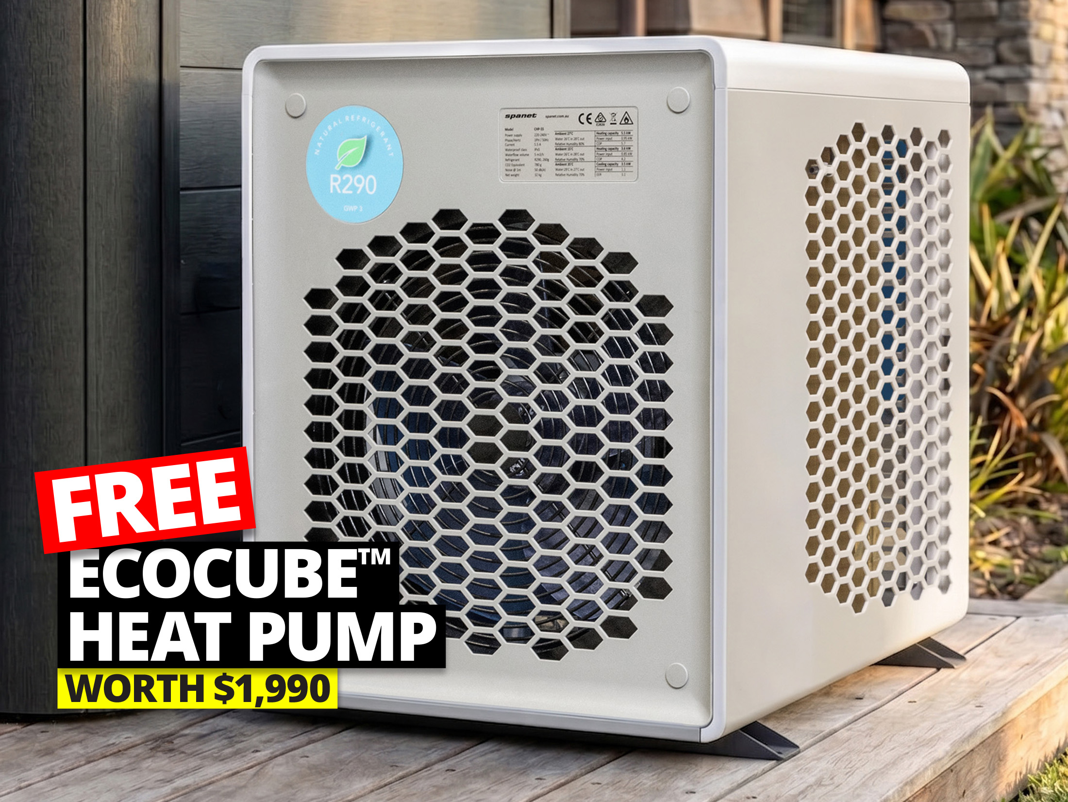 A white Ecocube heat pump with hexagonal vents sits outdoors on a wooden surface. Large text overlay reads "FREE ECOCUBE™ HEAT PUMP WORTH $1,990."